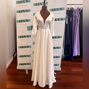 Deep V long sleeve open back A-line bridal gown